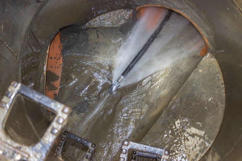 High-pressure hydro jetting equipment cleaning a sewer line in Larkspur.