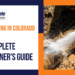 Hydro jetting nozzle cleaning a sewer pipe near tree roots outside a Colorado Springs home