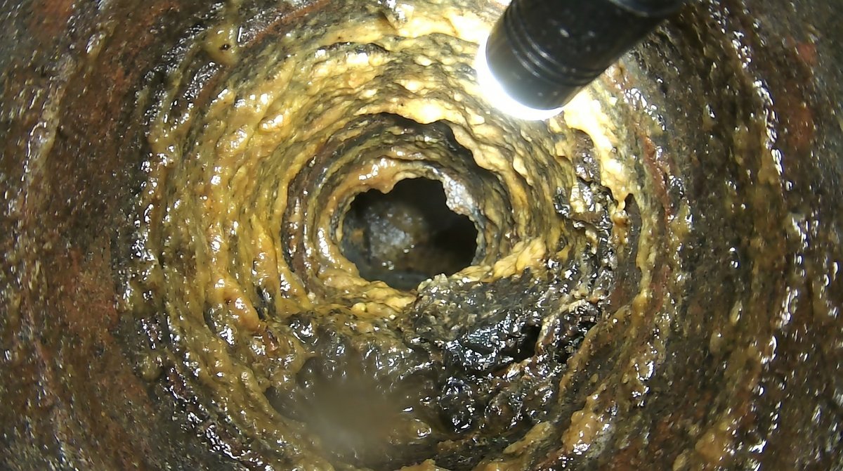 How often should you hydro jet depends on buildup like this grease-coated drain line