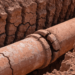 Cracked sewer pipe joint from expansive clay soil movement along the Colorado Front Range, Alphalete Trenchless