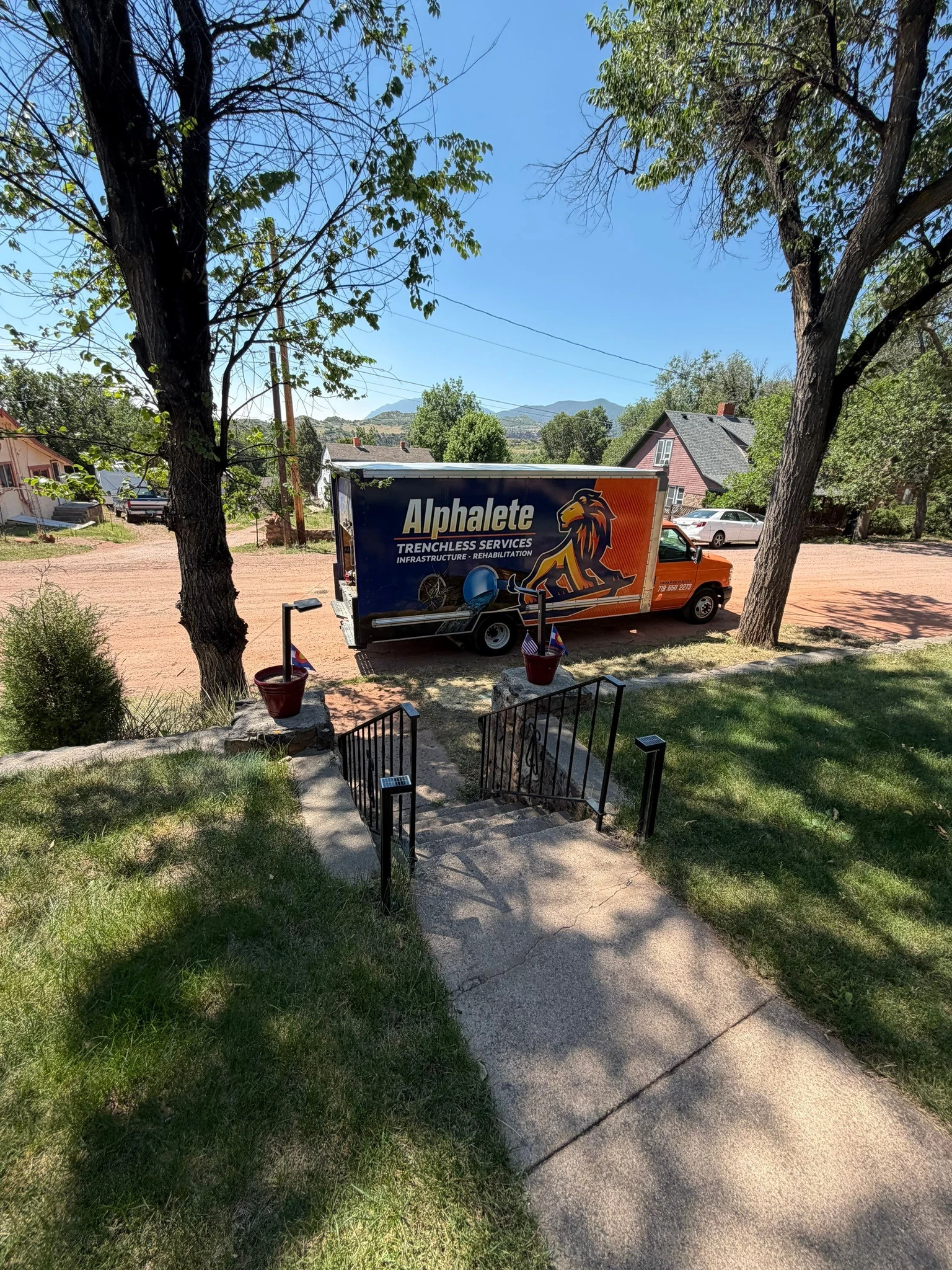 Alphalete Trenchless service truck serving a Colorado neighborhood