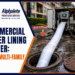 Alphalete Trenchless crew feeding a CIPP liner into a manhole at a Denver multi-family community for commercial sewer lining